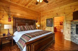 The bedroom in one of our Smoky Mountain Luxury Cabin Rentals