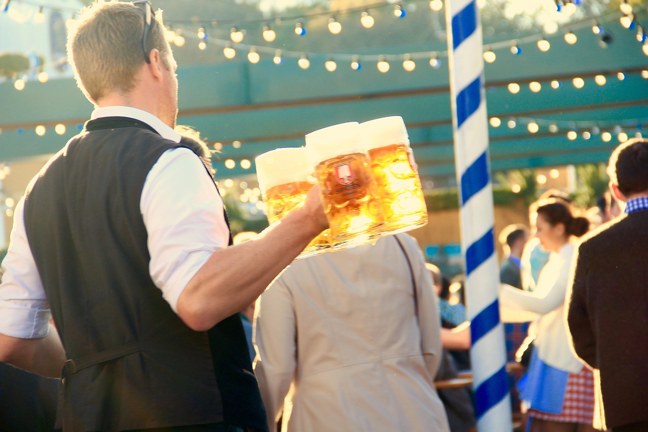 A man carrying beers at Oktoberfest
